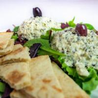 Spinach Dip · Spinach dip served with warm pita triangles. 