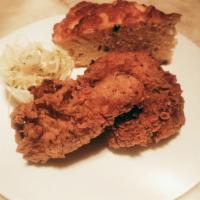 Fried Chicken · three pieces buttermilk fried chicken (breast, leg & thigh) with slaw and a homemade biscuit.