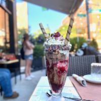 Knickerbocker Glory · 3 scoops ice cream (chocolate chip, vanilla & chocotorta) with mixed berries, topped with wh...