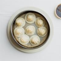 9. Seafood Xiao Long Bao · Fresh daily handmade soup dumplings with pork, shrimp, crab roe, scallions, and chicken brot...