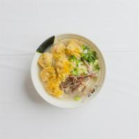 17. Pork Wonton Noodle Soup · Hand wrapped pork and shrimp wontons with handmade egg noodles and bbq pork slices. Topped o...