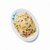 42. Yang Zhou Fried Rice · Fried rice with Chinese sausage, shrimp, peas, carrots, scallions, and lettuce. 