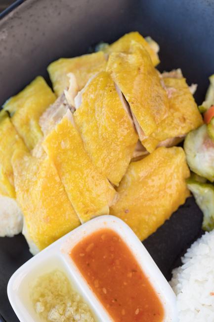 海南雞飯 Hainan Chicken · Served with our ginger and sweet chili sauce.