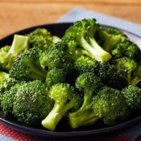 Steamed Broccoli · Fresh broccoli florets steamed and lightly buttered