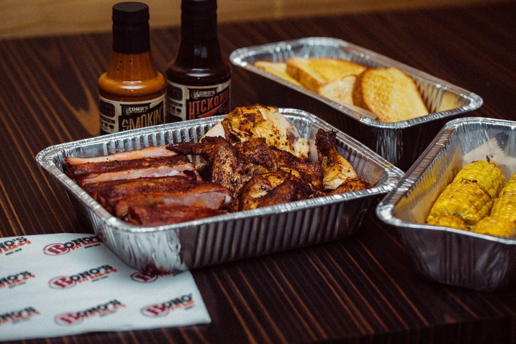 Hawg Feast · Feeds 5-7 people. 2 lbs. of meat, 1 whole chicken, 4 family sides, and 8 pieces of toast.