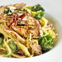 Spaghetti San Pietro · Spaghetti sauteed with broccoli, sun dried tomatoes, garlic and grilled chicken in a light p...