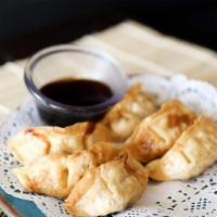 A10. Gyoza · 6 pieces of pot stickers deep-fried or pan-fried.