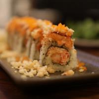 R1. Rock N Roll · Shrimp tempura, snow crab, avocado, salmon, macadamia nuts and masago.