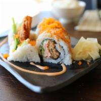 R30. Spider Roll · In: deep-fried soft shell crab, cucumber, snow crab. Out: masago.