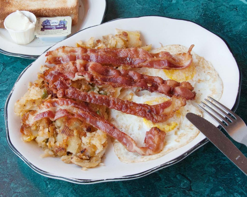2 Eggs with Bacon · Served with potatoes or grits and toast.
