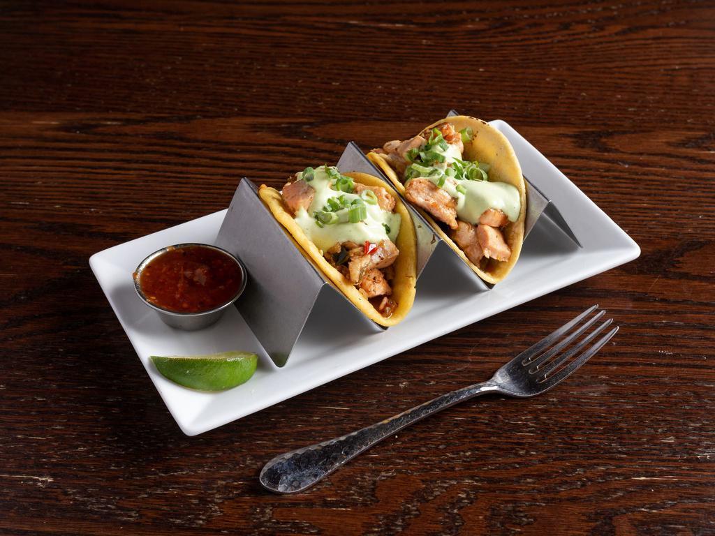 Salmon Tacos · Sauteed salmon, onion, garlic, bell peppers and cilantro dressing scallions.