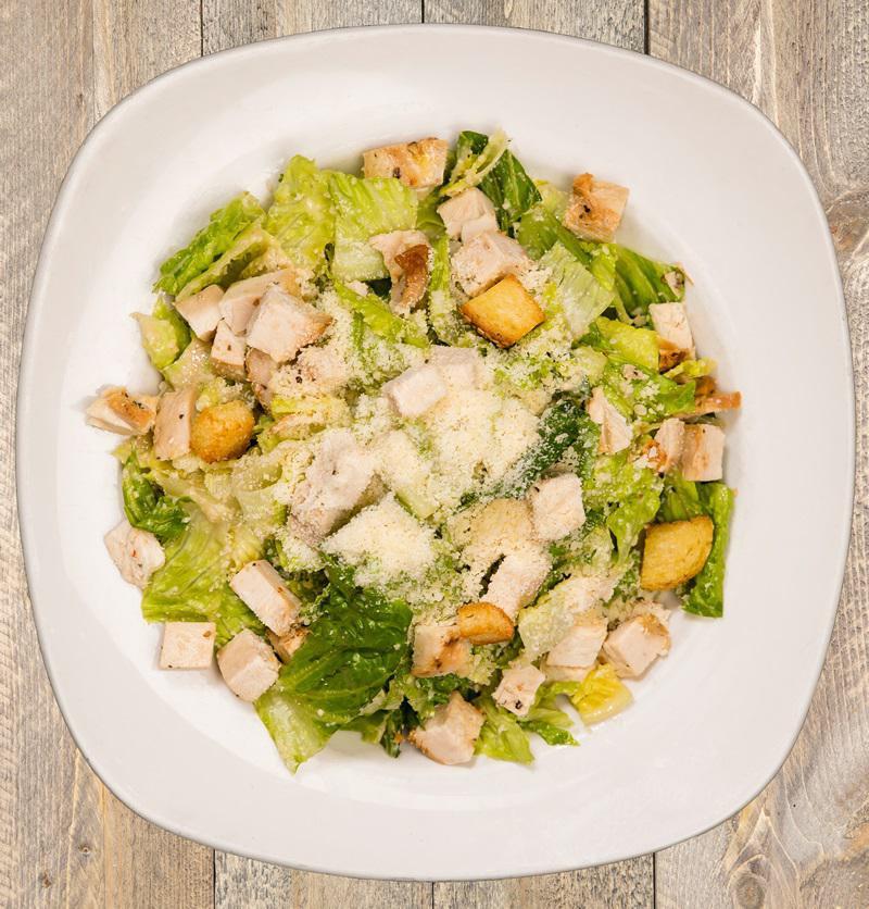 Chicken Caesar Salad · Roasted chicken, romaine, parmesan, croutons, and housemade caesar dressing.