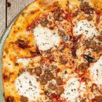 Sausage and Caramelized Onion Pizza · Red sauce, Italian sausage, fresh mozzarella, caramelized onions, and spin blend cheese.