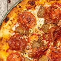3 Meats Pizza · Red sauce, meatballs, Italian sausage, pepperoni, and spin blend cheese.