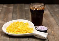 Mac and Cheese · Macaroni and Cheese served with a drink and a scoop of gelato.