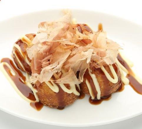 A1. Takoyaki · Ball-shaped fried appetizer containing octopus and various vegetables. Served as 5 pieces.