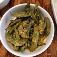 A7. Edamame · Steamed edamame, tossed in a citrus and sesame vinaigrette