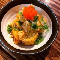 A11. Rock Shrimp · Tempura battered shrimp that is fried and tossed in a spicy mayo, then garnished with scalli...