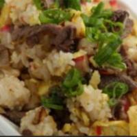 F1. Beef Fried Rice · Fried rice containing beef and various vegetables