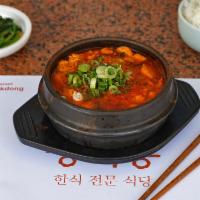 Seokk-Eo Sundubu · Spicy soft tofu stew with beef and seafood. Soft tofu stew with beef and seafood. Soft tofu ...