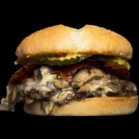 Fun Guy Burger · Bacon, mushrooms, melted Swiss, house sauce, grilled onion & pickle. Every burger comes with...