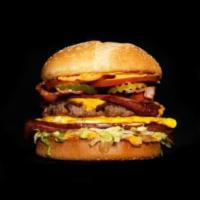 Pint-Size Barnyard Burger · 3 oz. patty and smaller bun. Bacon, ham, egg, American, lettuce, tomato, house sauce, grille...