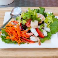 Spicy Seafood Salad · Shrimp, fish, mussel, scallop, calamari, chili, garlic, onion, Chinese celery, green leaf, t...