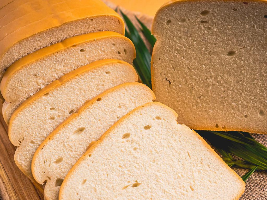 Hard Dough Bread · Thick on the outside, dense and tender on the inside with a hint of sweetness. Perfect for sandwiches, or to toast with butter.