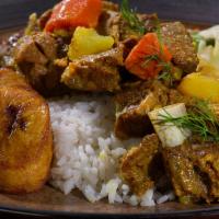 4. Curried Goat Meal · Goat meat marinated in curry and other Caribbean spices. With steamed vegetables and choice ...