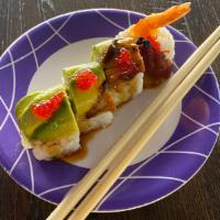Dragon Roll - 4 Pieces · Shrimp tempura, cucumber topped with eel, avocado and eel sauce.