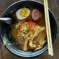 #Miso Ramen · Ramen noodles in miso broth with Japanese Naruto fish cake, scallions, 1/2 boiled egg, bambo...