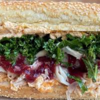 Colonial · House Roasted Turkey, Sweet Potato Ricotta, Ginger Cranberry Sauce, Brie Cheese, Garliky Kale