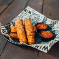 Mozzarella Logs · Hand battered with panko bread crumbs.