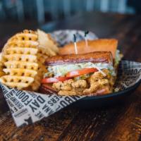 Fried Catfish Poboy · Seafood poboys dressed with lettuce, tomatoes, mayo and pickles.