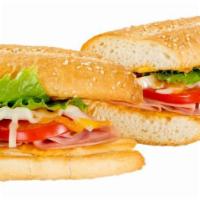 Ham & Cheese Sandwich · Canadian bacon and Sarpino's cheese mix topped with fresh onions, crispy lettuce and ripe to...