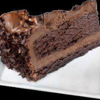 Chocolate Mousse Cake · Rich chocolate mousse served over a chocolate cake layer, topped with chocolate ganache.