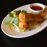 Crispy Spring Rolls Chicken-2 Pieces · Chicken wrapped in thin spring roll shell and deep-fried.