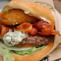 Black and Blue Burger · Blue cheese crumbles, jalapenos, bacon, onion rings, mayo, lettuce, and tomato.