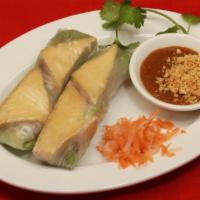 48. Goi Cuon Chay · 2 pieces of vegetarian spring rolls. Fried tofu, rice noodles, lettuce, cucumber, and mint w...