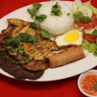 23. Com Dac Biet · Special plate combination, grilled beef, pork, chicken, fried egg & Vietnamese egg roll.