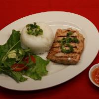 29. Grilled Salmon · Marinated 8 oz. salmon filet grilled to perfection served with choice of steamed rice or ric...