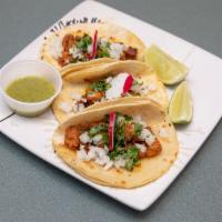 Tacos  · 3 pieces. Your choice of beef, carnitas, chicken or adobada served in a soft tortilla.