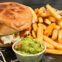 Torta · Bread bun, avocado, beans, cheese, onion, tomato, and choice of meat served with fries.
