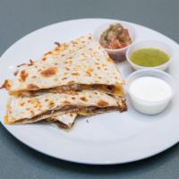 Quesadillas · Grilled flour tortilla with beans, cheese, salsa, and sour cream, served with choice of meat...