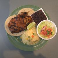 Combination Plate · Serves 2. Includes a marinated steak, pork carnitas, a rolled taco, homemade tortillas, rice...