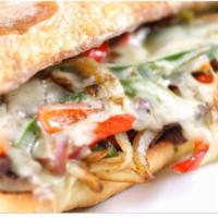 Philly Cheesesteak Hero with Fries · Fried onions, peppers and melted cheese.