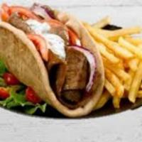 Chicken Gyro Platter · Sandwich with fries and a Greek salad 
