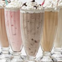 Breyer’s Strawberry Milkshake  · Three scoops of Breyer’s strawberry IceCream with Hershey’s syrup and milk