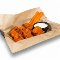 Boneless Wings · 100% all-natural chicken wings tossed in our signature sauces and dry rubs