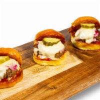 Slamburgers · Three mini burgers with american cheese, pickled red onion, ketchup, mustard, pickles